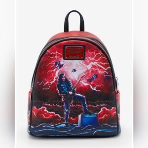 Loungefly Stranger Things Eddie Munson Hellfire Club Glow-in-the-Dark Backpack